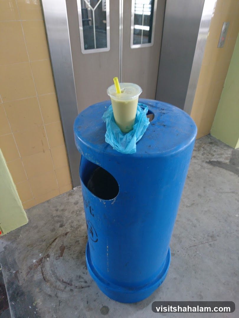 Drink on Trash Can