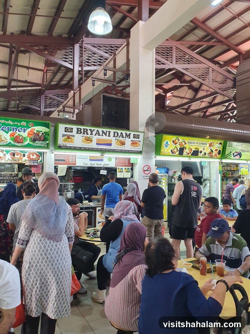 Food court with many stalls and patrons