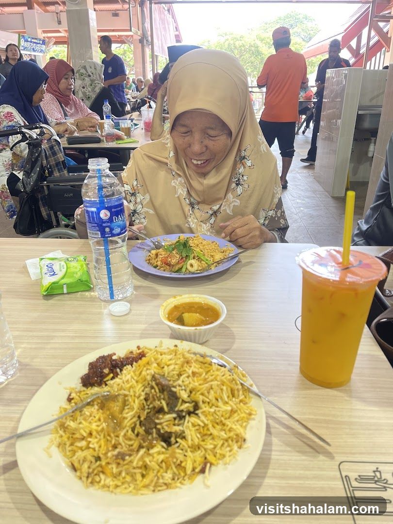 People enjoying a meal at an outdoor food court