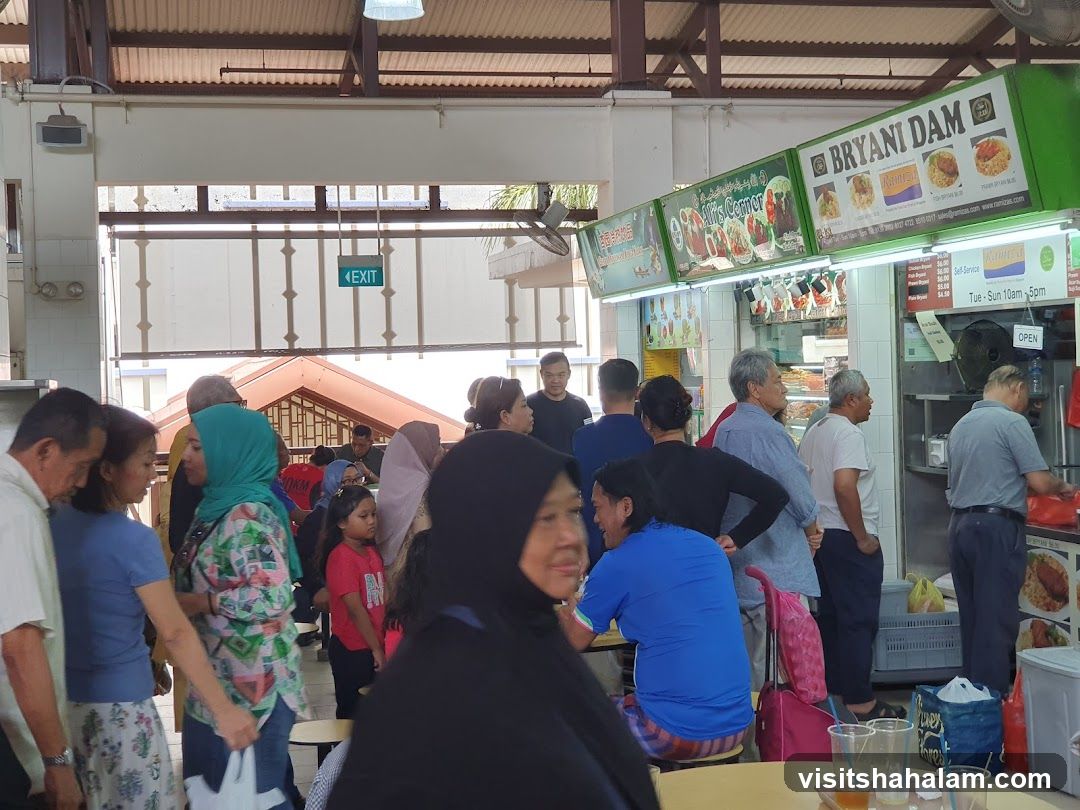 Busy Food Stall with Customers