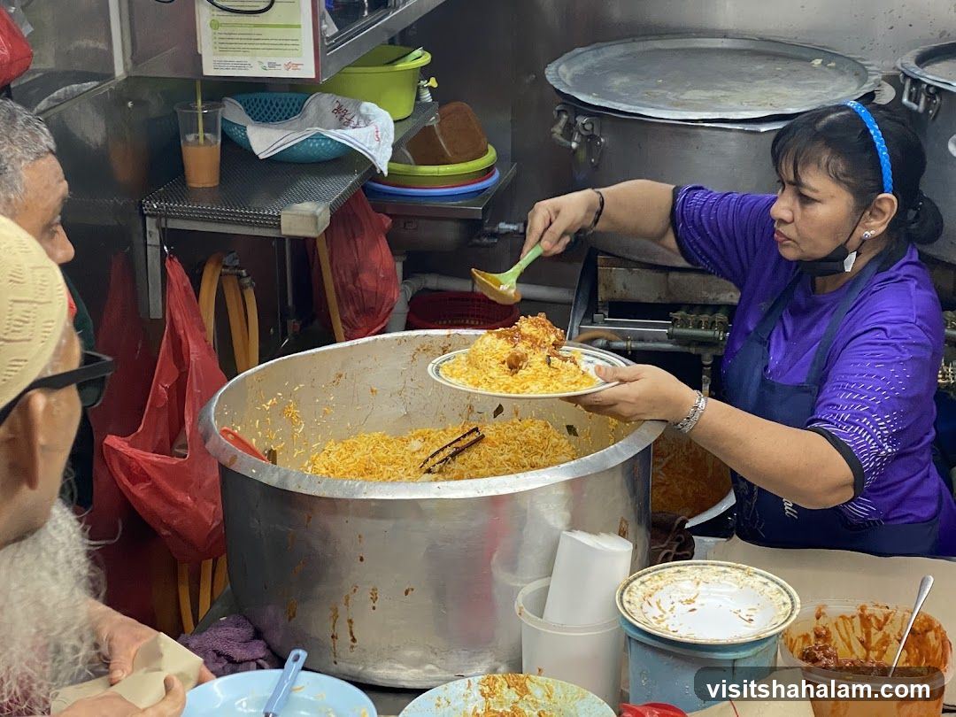 Food Stall Vendor Serving Rice