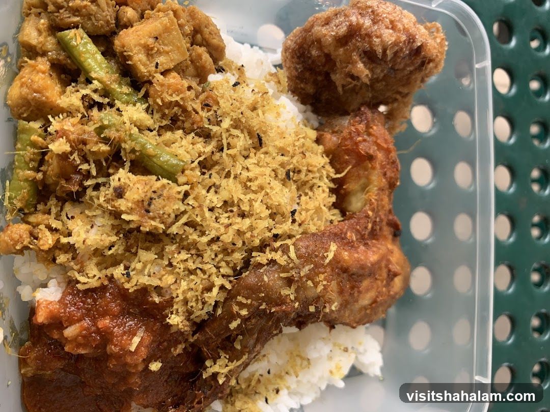 Rice dish with fried chicken and vegetables