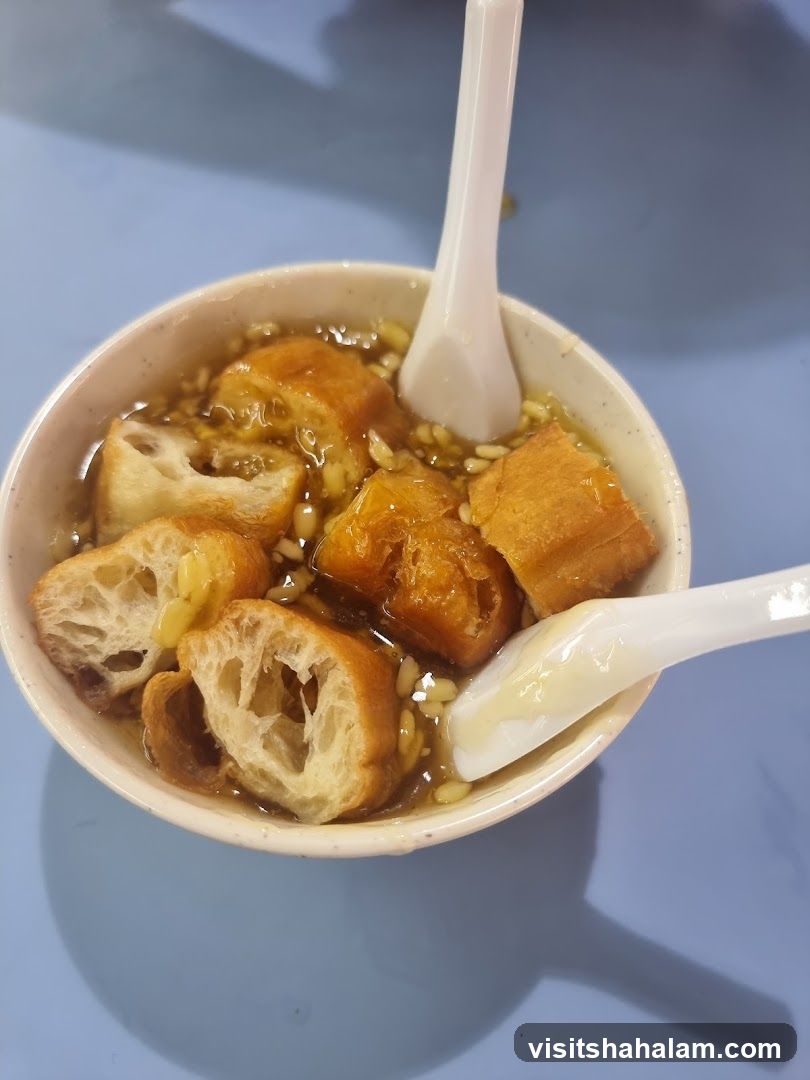 Bowl of dessert with fried dough sticks
