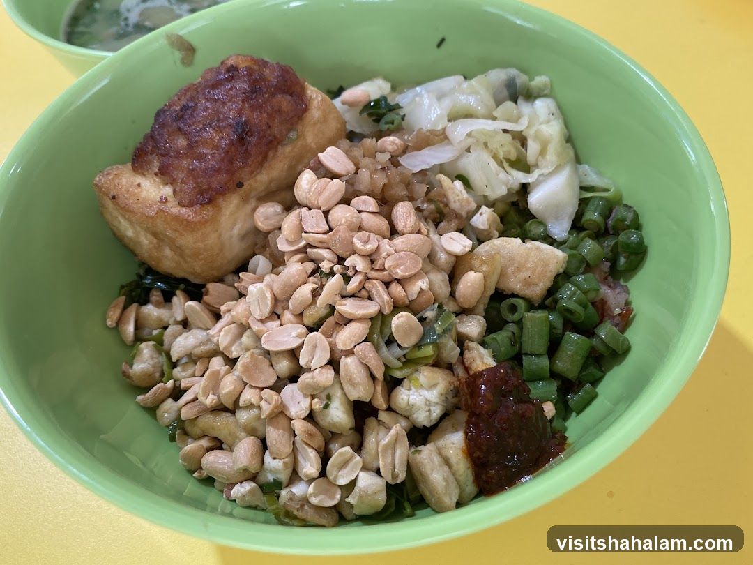 Bowl of Food with Peanuts and Vegetables