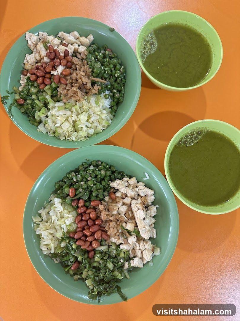 Two bowls of rice with toppings and drinks