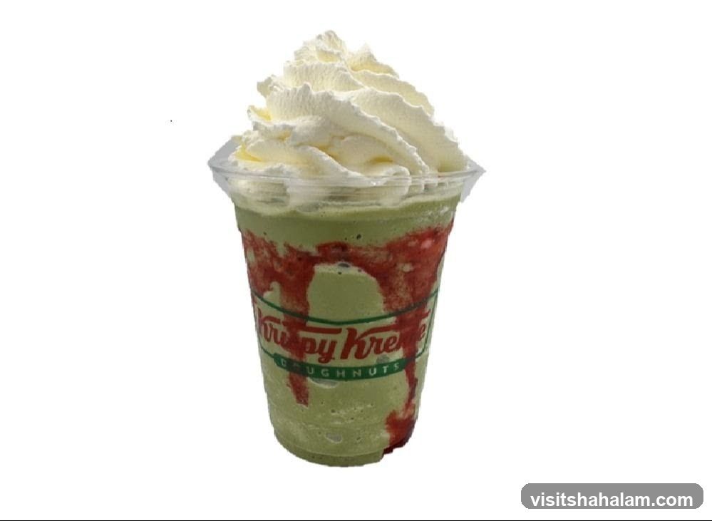 Green Frappe with Whipped Cream and Strawberry Drizzle