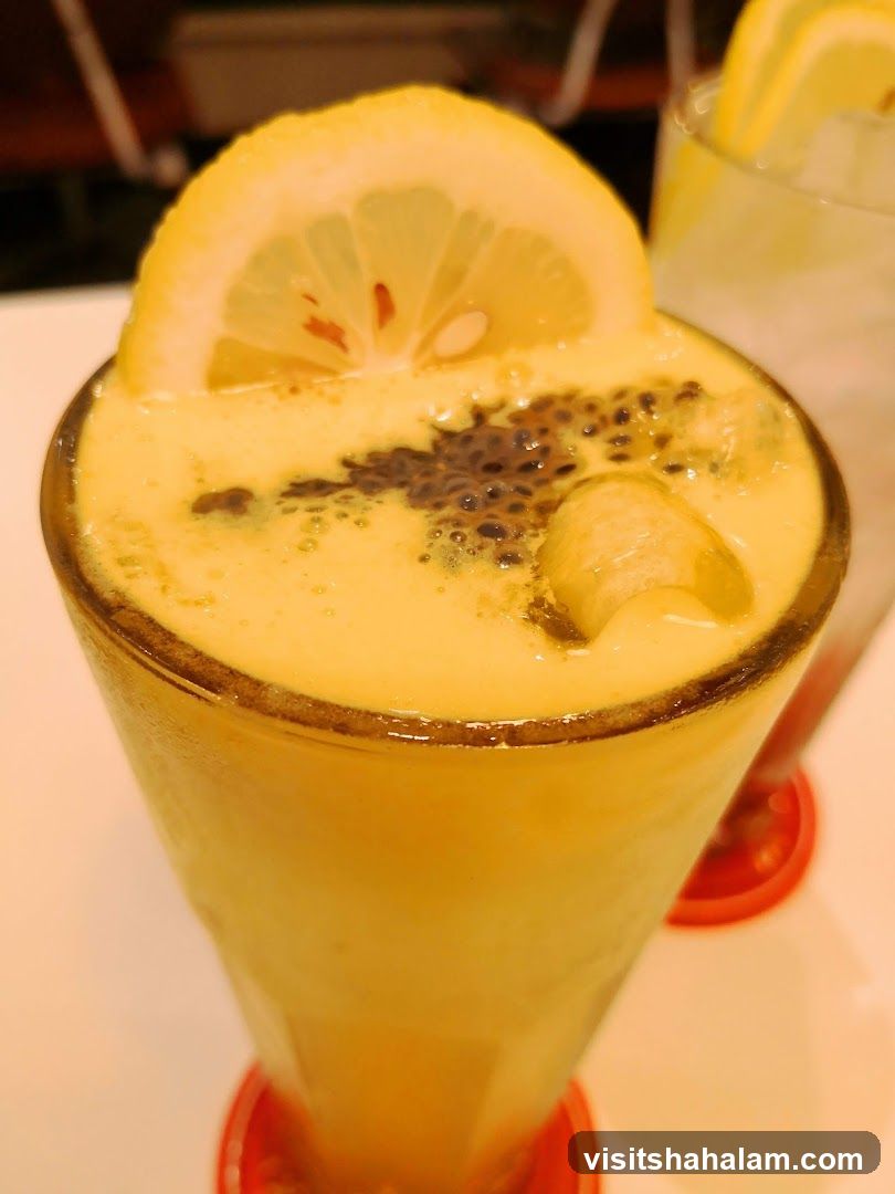 Yellow Drink with Lemon Slice
