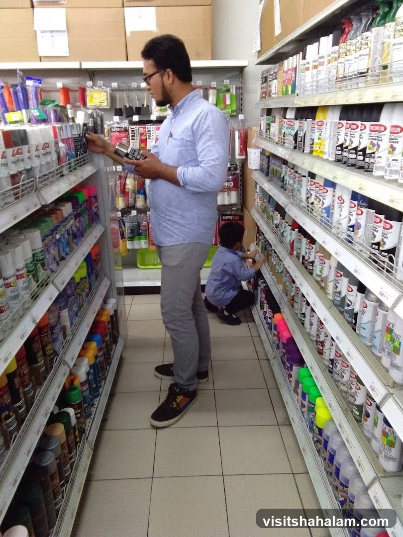 Aisle in a store with spray paint cans