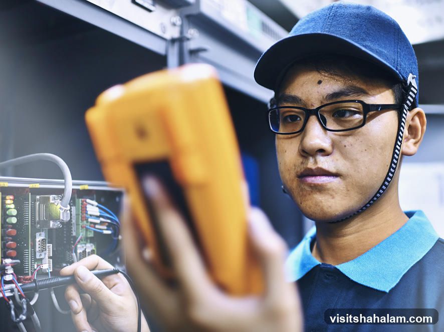 Technician testing electronics