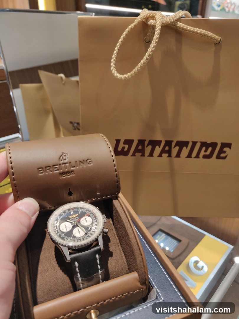 Breitling watch in presentation box with shopping bag