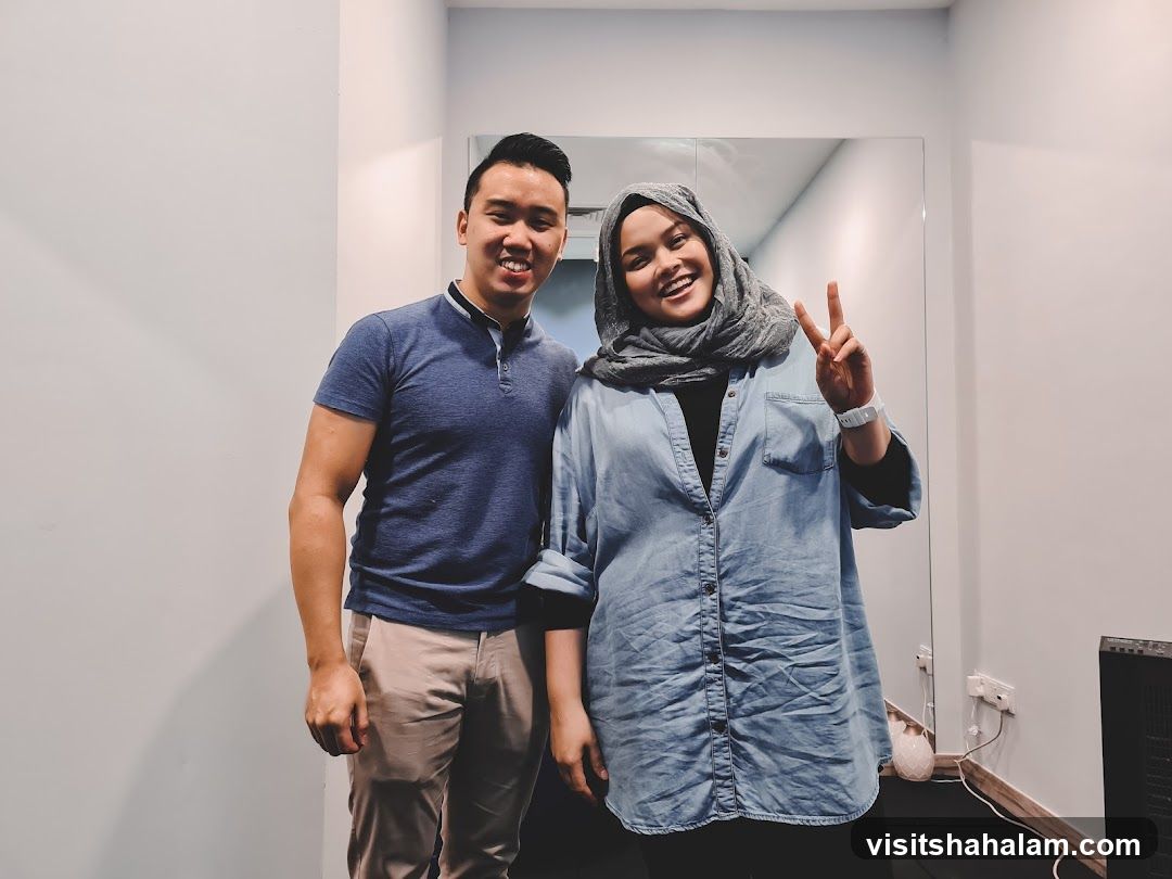 Two people posing for a photo