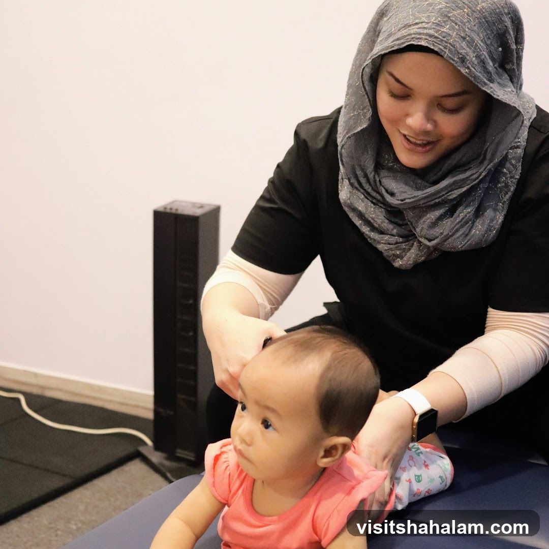 Therapist working with a baby