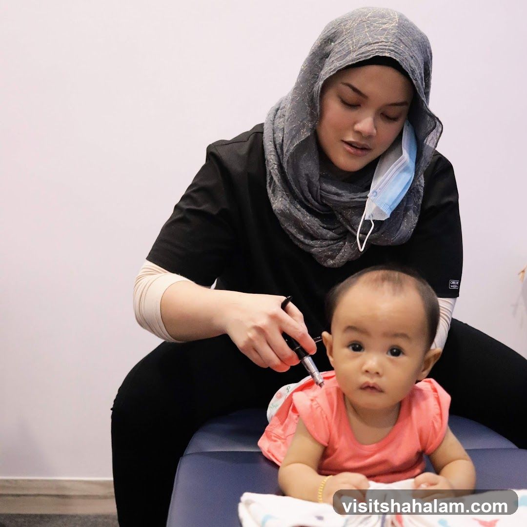 Practitioner with Baby