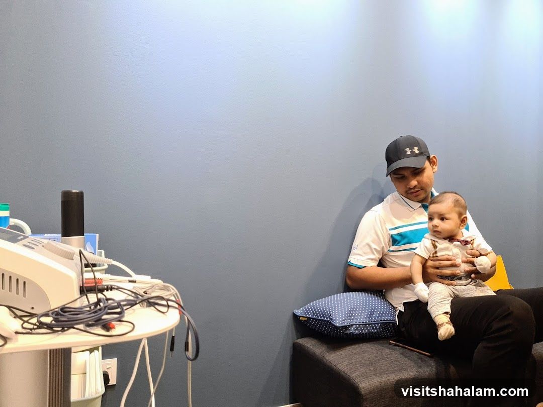 Man and baby waiting