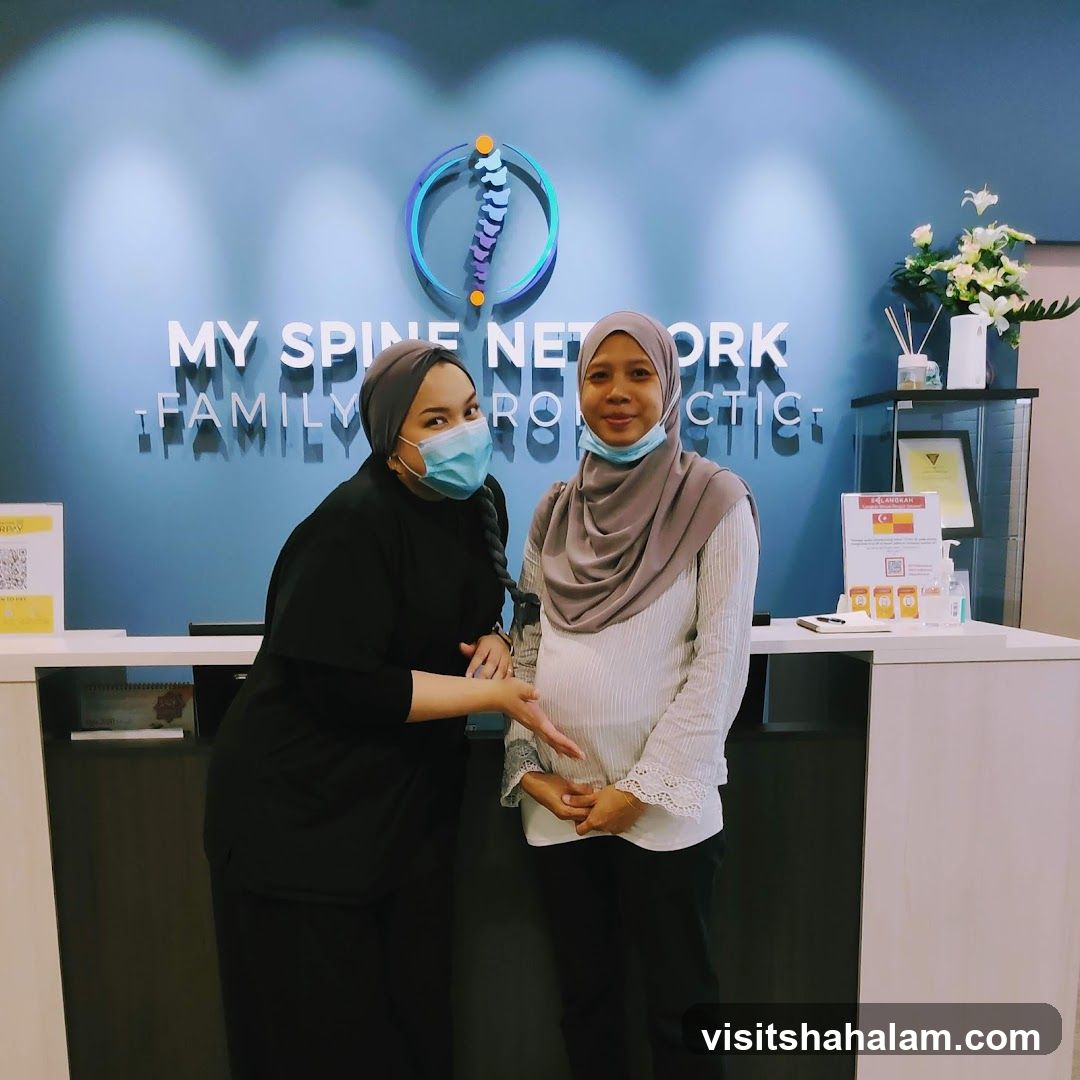 Two women at a reception desk