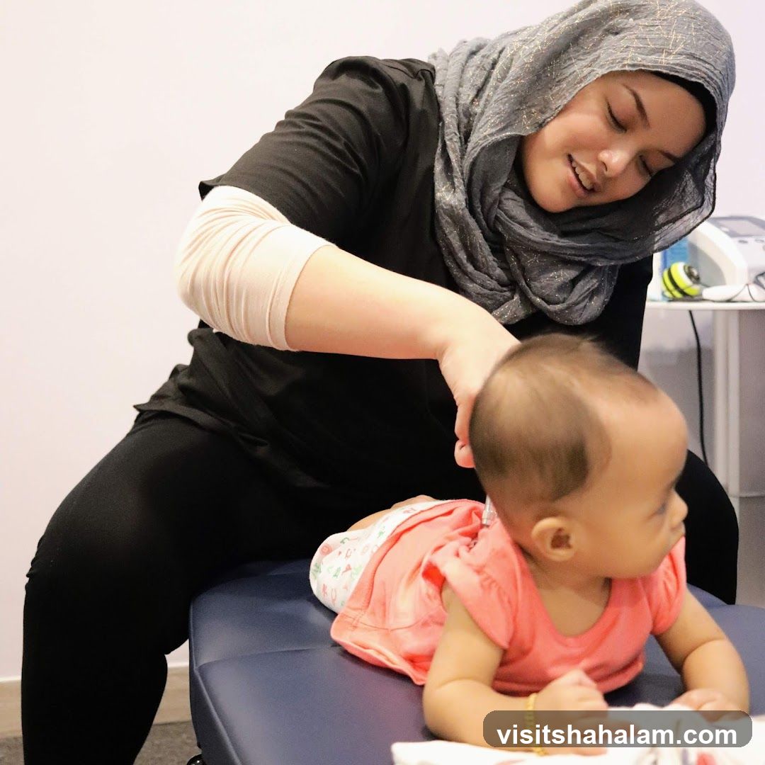 Therapist examining a baby