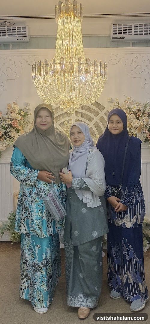 Three women posing for a photo