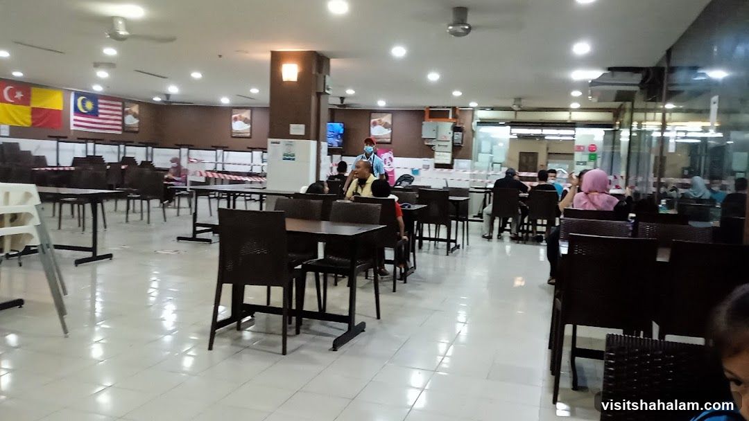 Indoor dining area with tables and chairs