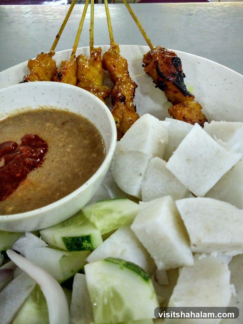 Chicken Satay with Peanut Sauce and Rice Cakes