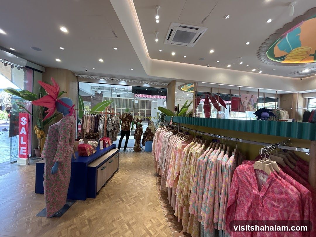 Clothing store interior with mannequins and apparel