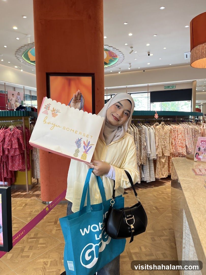 Woman holding shopping bags in a store