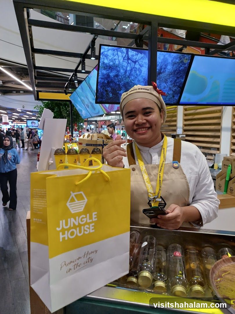 Staff Member with Jungle House Bag