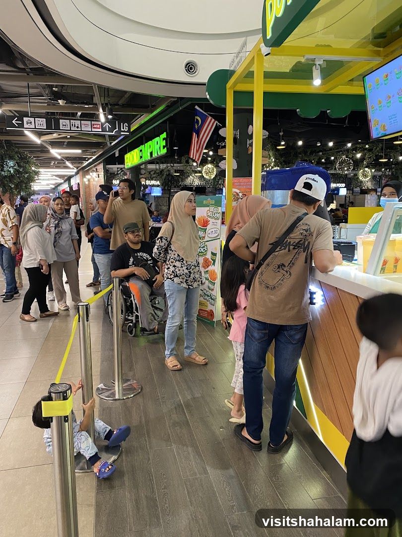 People queuing at a food stall