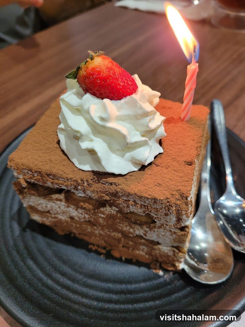 Chocolate cake with strawberry and candle