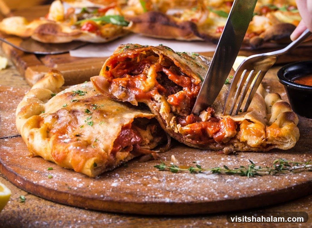 Calzone being cut