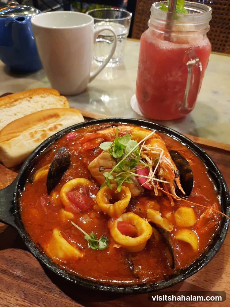 Seafood Stew with Bread and Drink