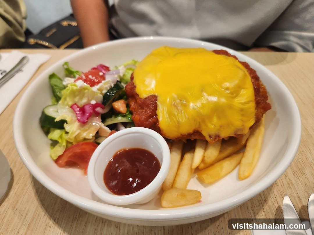 Chicken Schnitzel with Salad and Fries