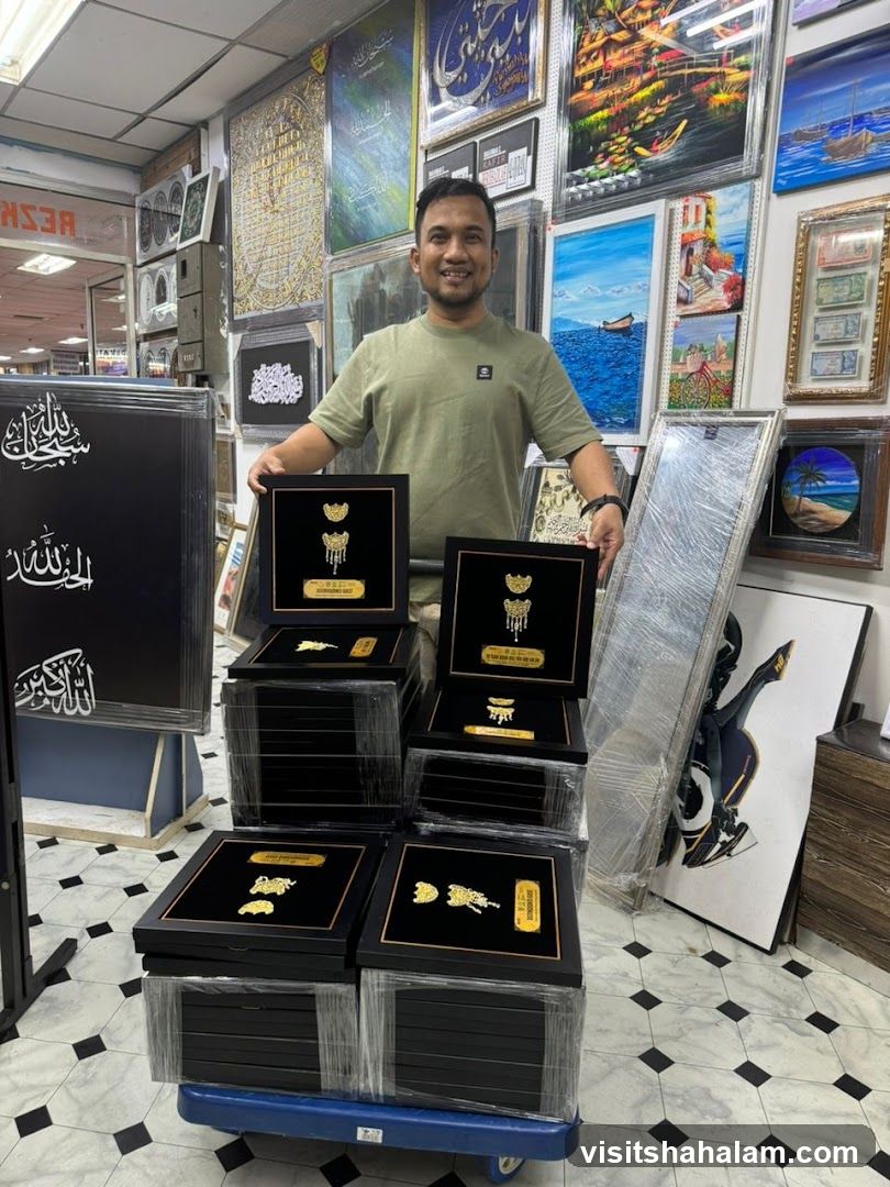Man holding framed artwork in a shop