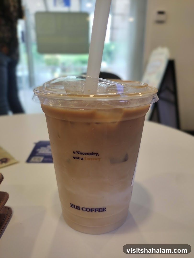 Iced Coffee with ZUS COFFEE branding