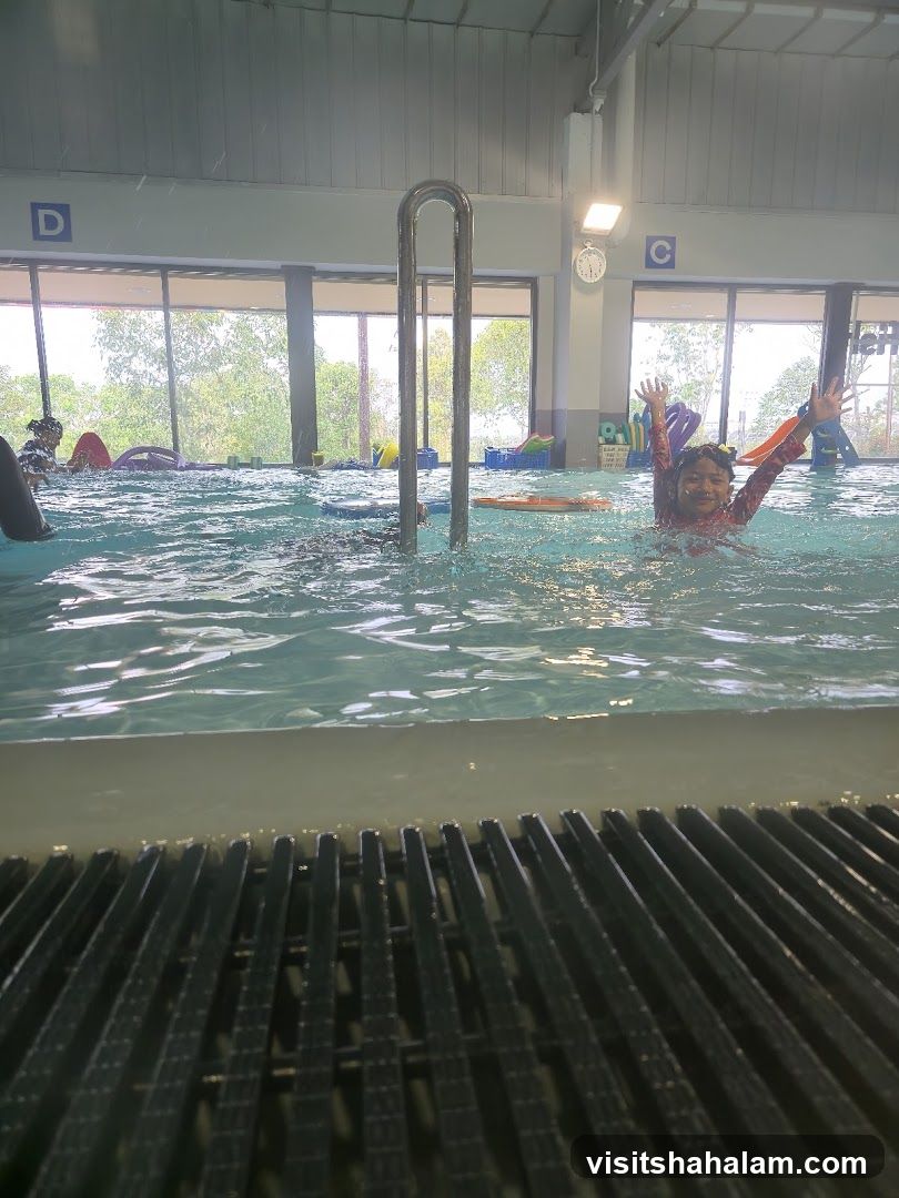 Children enjoying a swimming pool