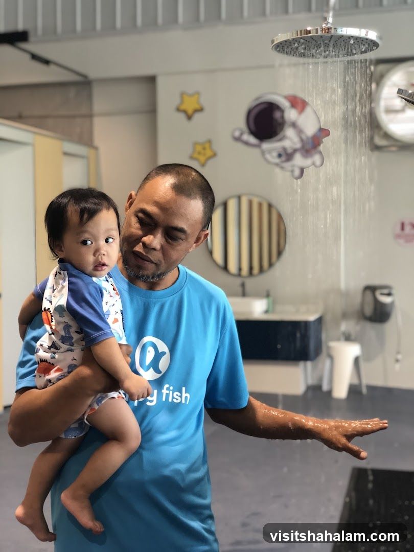 Man and child in a shower area