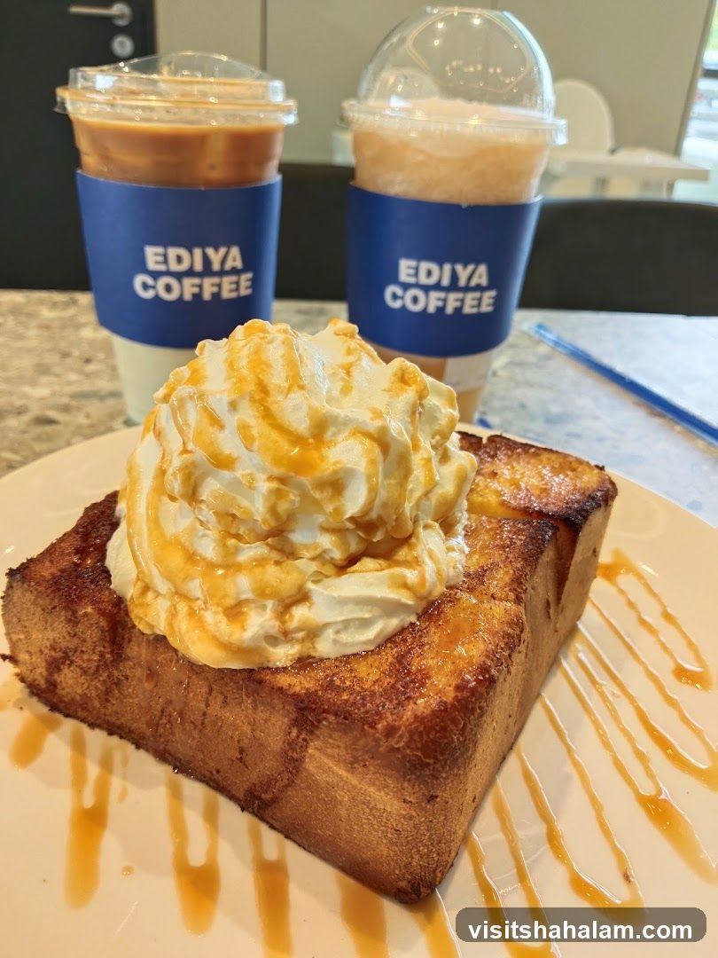 Whipped cream topped toast with caramel drizzle and two iced coffees
