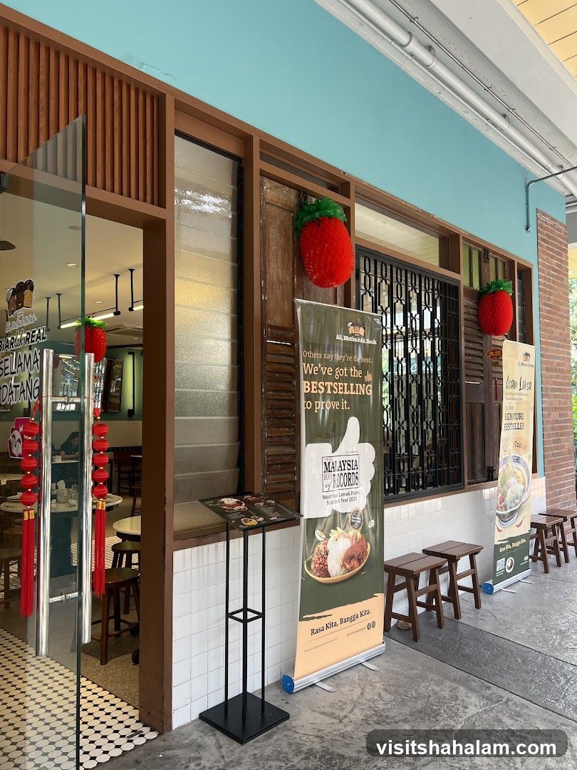 Restaurant Entrance with Banners and Menu Stand