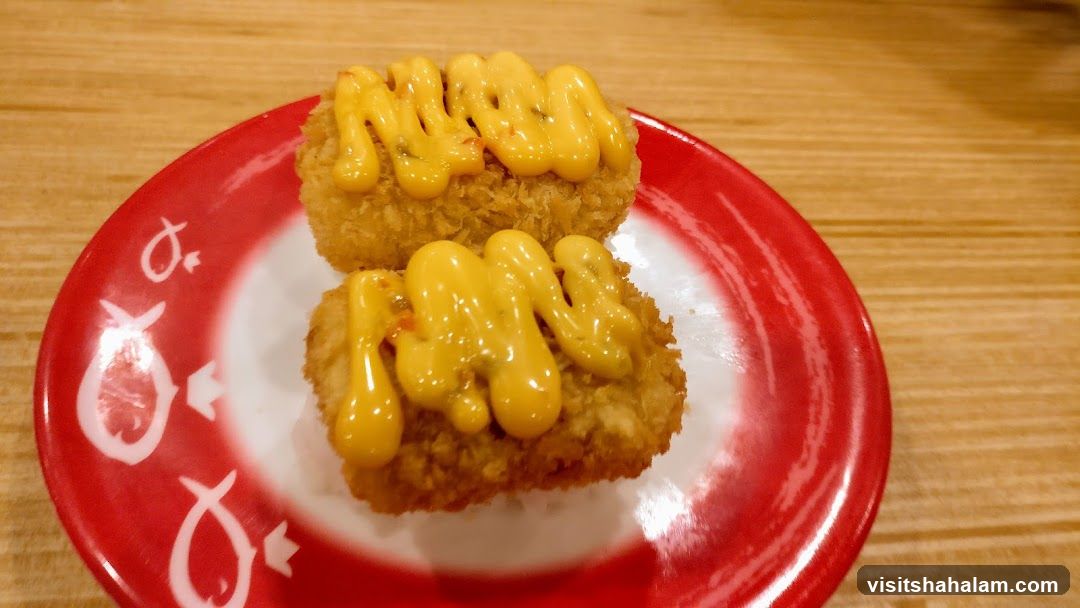 Fried Croquettes with Cheese Sauce