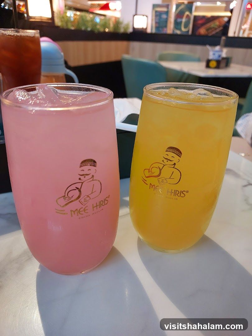 Two colorful drinks with logo