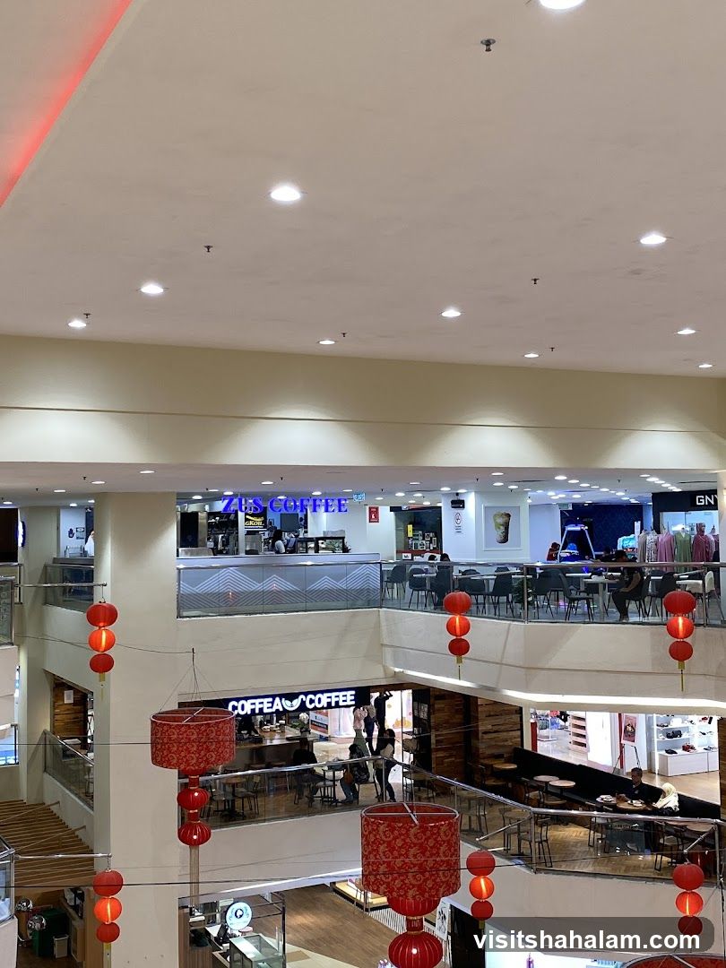 Interior of a shopping mall with coffee shops