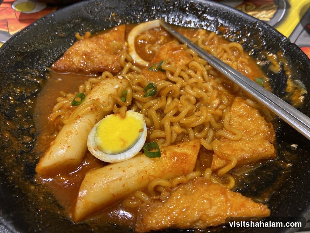 Spicy Korean Rice Cakes with Noodles and Egg