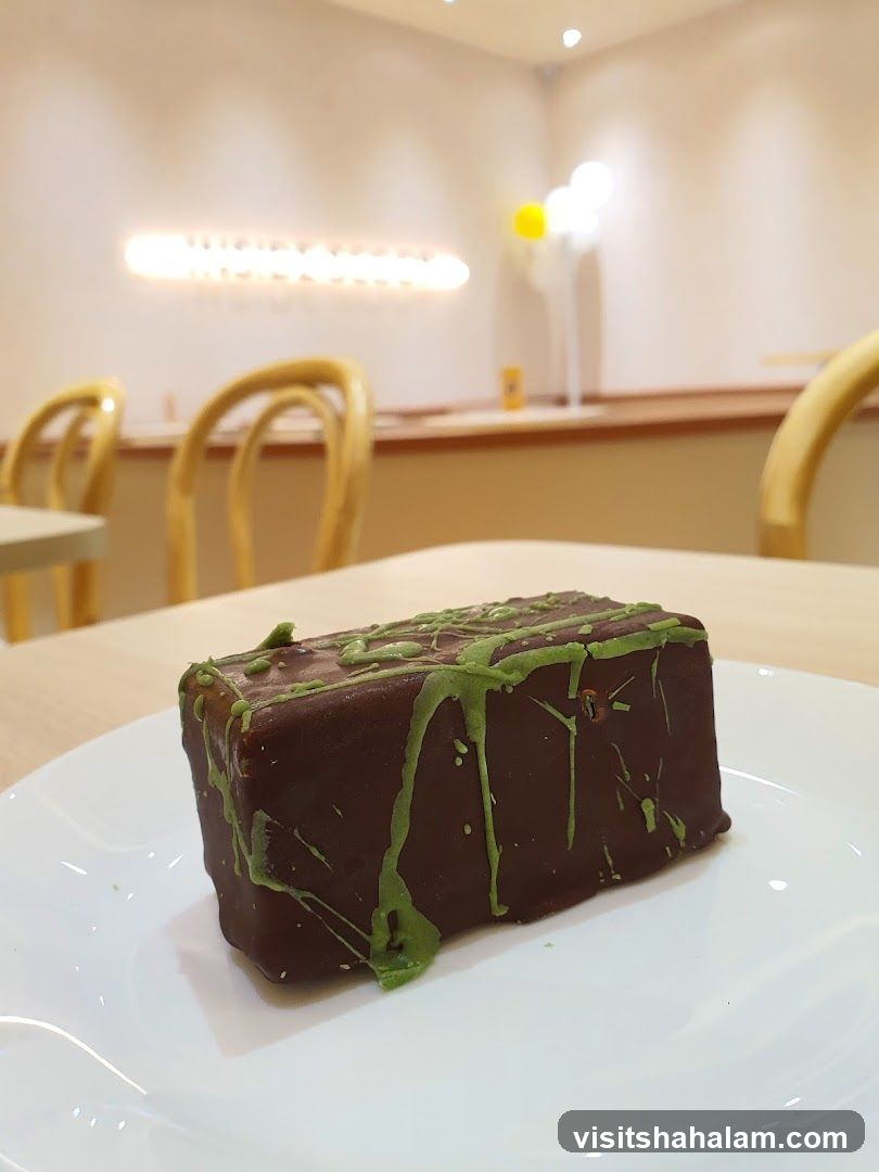Chocolate dessert with green drizzle