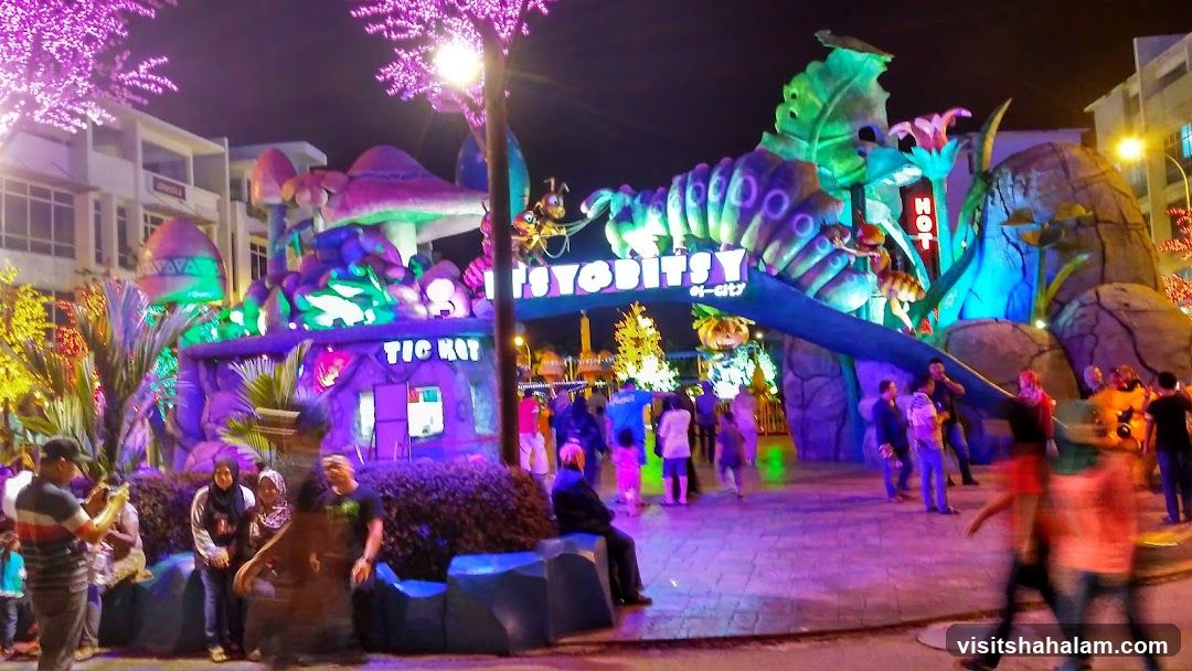 Amusement Park Entrance at Night