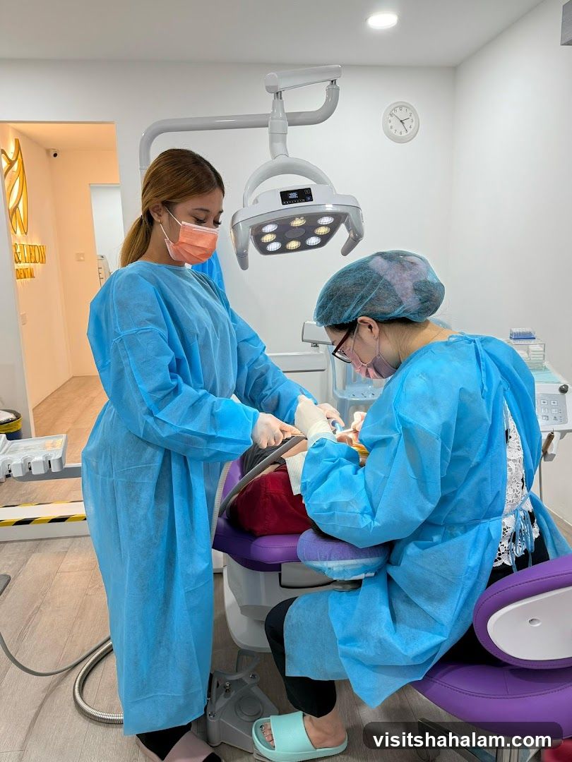 Dentist and assistant performing a dental procedure