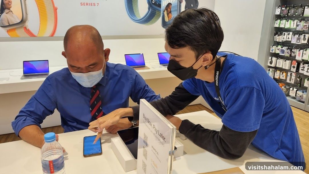 Salesperson assisting customer
