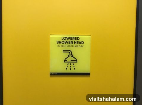 Shower head sign