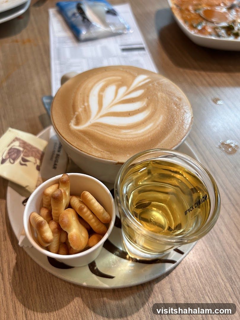 Coffee with latte art and snacks