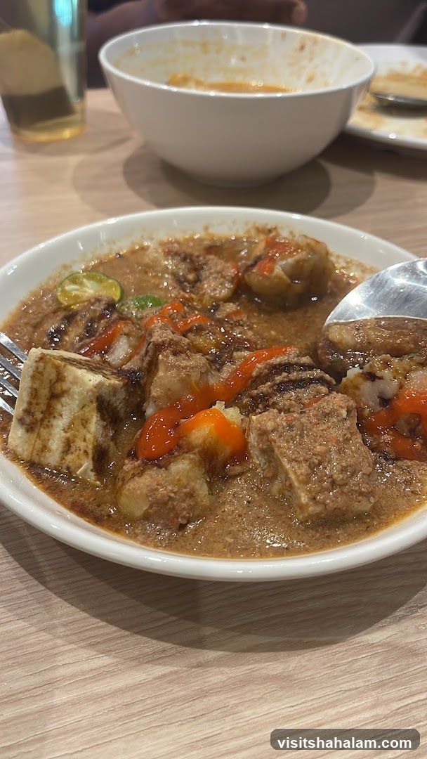 Bowl of Food with Sauce