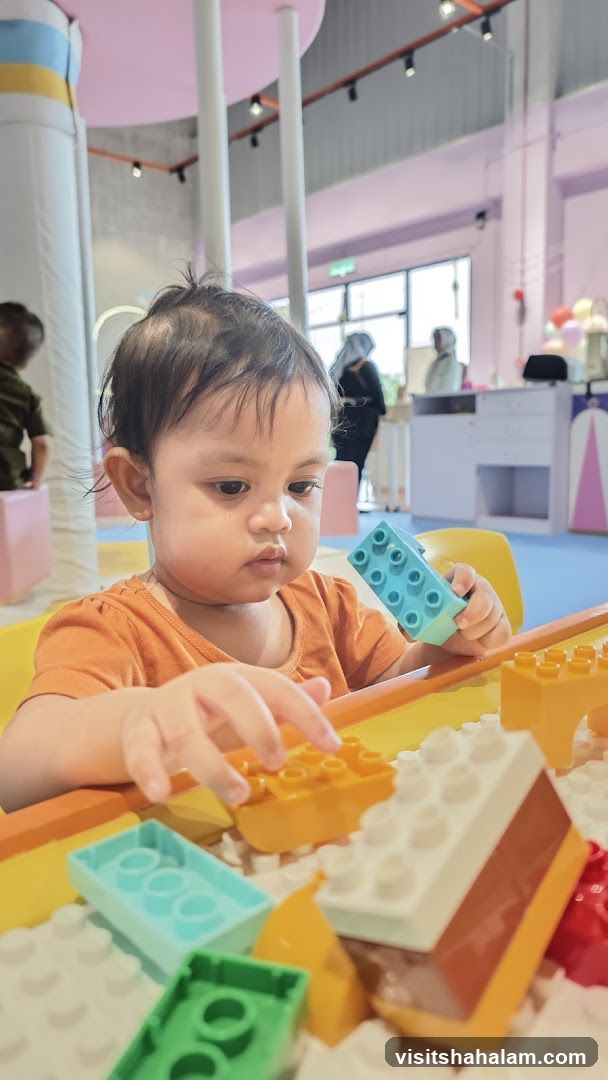 Child playing with building blocks