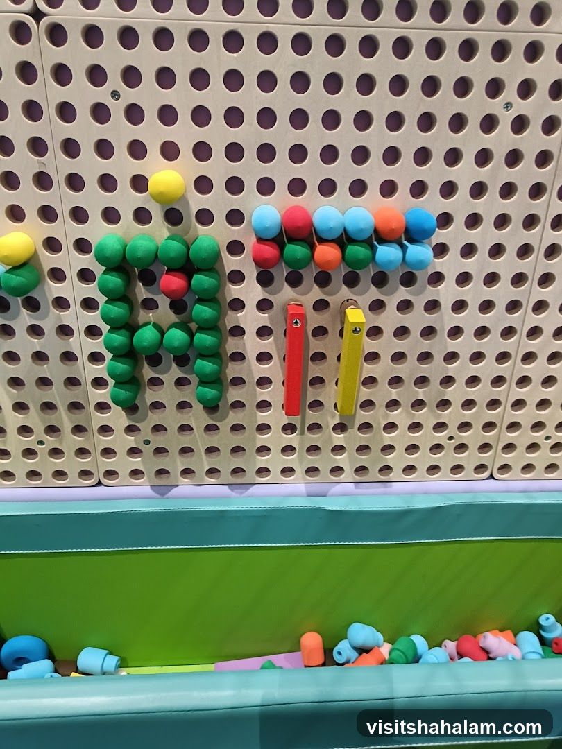 Pegboard with colorful balls and blocks